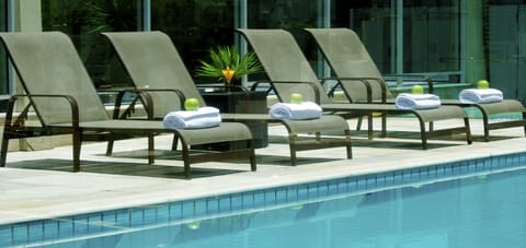 Outdoor pool, pool umbrellas, sun loungers