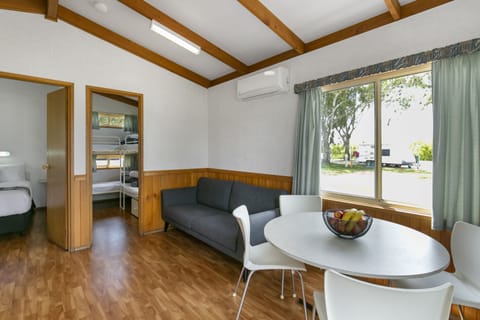 Riverview Villa | Living area | Flat-screen TV, DVD player