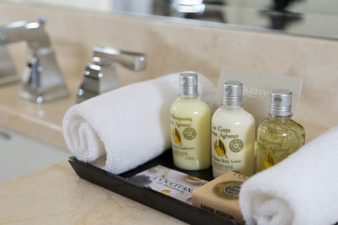 Designer toiletries, hair dryer, bathrobes, towels