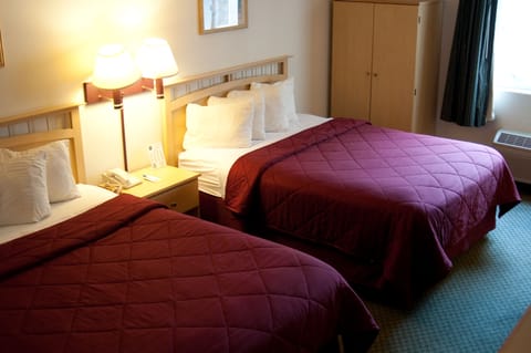 Standard Room, 2 Queen Beds, Non Smoking | In-room safe, desk, blackout drapes, soundproofing