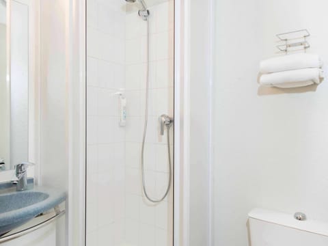 Shower, eco-friendly toiletries, towels, soap