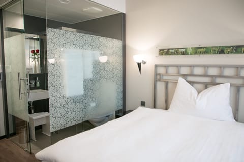 Blackout drapes, iron/ironing board, free WiFi, bed sheets