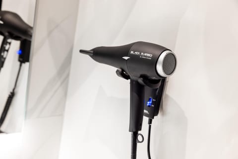 Shower, rainfall showerhead, eco-friendly toiletries, hair dryer