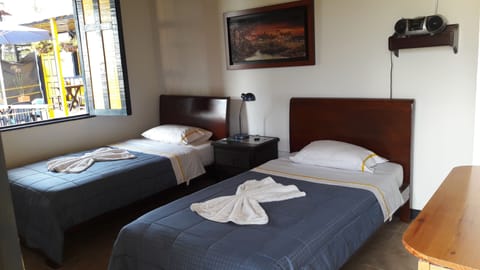 Twin Room, Private Bathroom | In-room safe, iron/ironing board, free WiFi, bed sheets