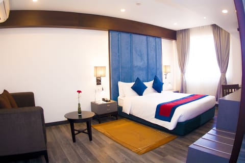 Deluxe Double or Twin Room, 1 Double or 2 Twin Beds, City View | 1 bedroom, premium bedding, minibar, in-room safe