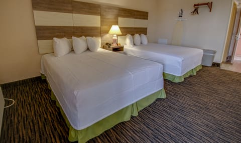 Comfort Room, 2 Queen Beds (Partial Ocean View) | Desk, blackout drapes, iron/ironing board, free WiFi