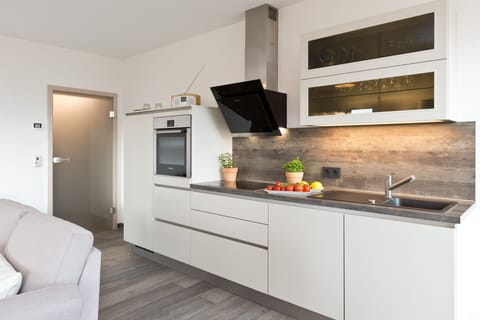 Apartment, 2 Bedrooms (Grosses Meer) | Private kitchen | Full-size fridge, oven, stovetop, dishwasher