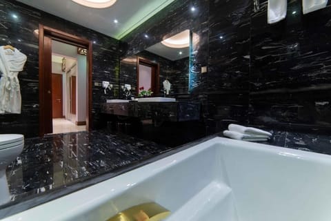 Penthouse Villa | Bathroom | Hydromassage showerhead, hair dryer, bathrobes, slippers