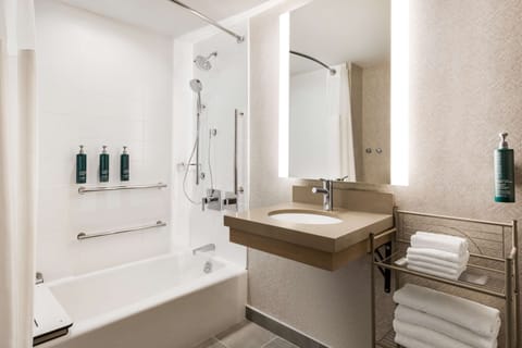 Room, 1 King Bed, Bathtub (Mobility) | Bathroom | Combined shower/tub, free toiletries, hair dryer, towels