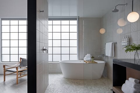 Suite, 1 King Bed (Design) | Bathroom | Designer toiletries, hair dryer, bathrobes, slippers