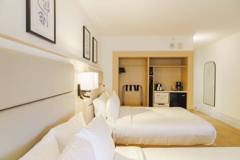 Premium Room, 2 Queen Beds, Partial Ocean View | In-room safe, blackout drapes, iron/ironing board, free WiFi