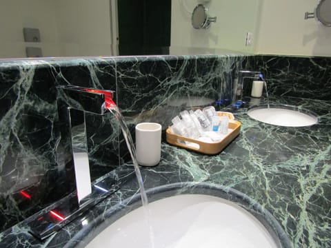 Suite, Terrace | Bathroom | Separate tub and shower, rainfall showerhead, free toiletries