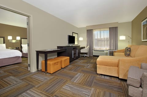 Suite, Two Queen Beds | Living area | 32-inch flat-screen TV with cable channels, TV