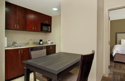 Suite, Two Queen Beds | Private kitchen | Fridge, microwave, coffee/tea maker