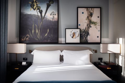 Premium bedding, down comforters, memory foam beds, free minibar items