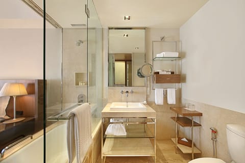 Deluxe Room | Bathroom | Combined shower/tub, deep soaking tub, rainfall showerhead