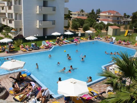 Outdoor pool, open 7:30 AM to 6:00 PM, pool umbrellas, sun loungers