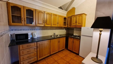 Luxury Penthouse, 2 Bedrooms | Private kitchen | Fridge, microwave, stovetop, cookware/dishes/utensils