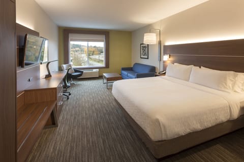 Suite, 1 King Bed | In-room safe, blackout drapes, iron/ironing board, free WiFi