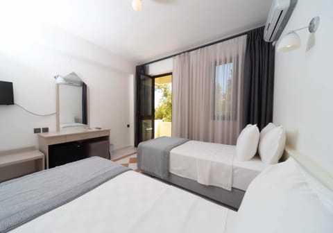 Economy Single Room, Balcony | Minibar, individually furnished, desk, iron/ironing board