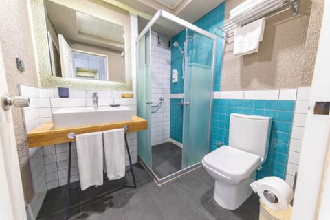 Standard Room, Balcony | Bathroom | Shower, free toiletries, hair dryer, slippers