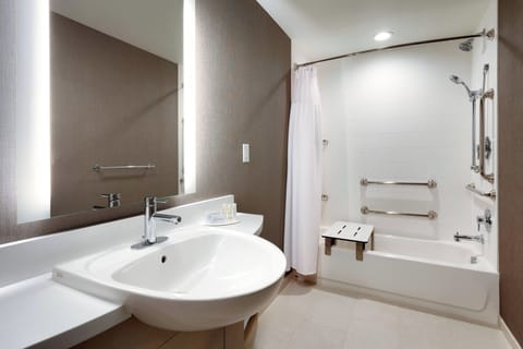 Suite, 1 King Bed with Sofa bed | Bathroom | Hair dryer, towels