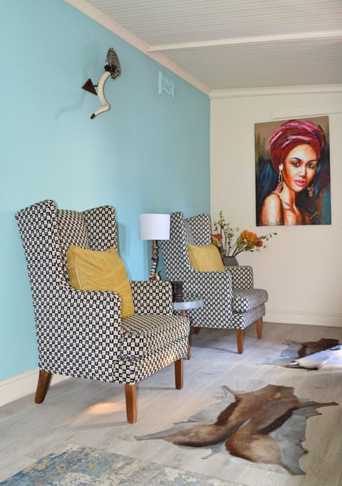 Kruger House - Elephant Suite  | Living area | Flat-screen TV