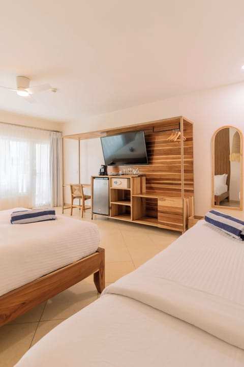 Standard 2 Queen with Balcony Courtyard View | Down comforters, minibar, in-room safe, free WiFi