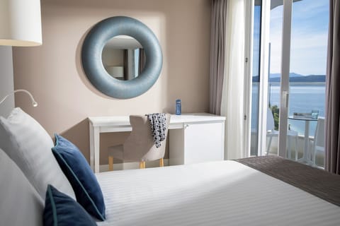 Superior Double Room, Sea View | Hypo-allergenic bedding, minibar, in-room safe, blackout drapes