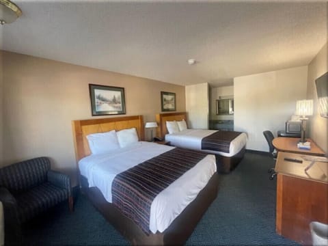 Deluxe Room, 2 Queen Beds | Individually furnished, desk, laptop workspace, blackout drapes