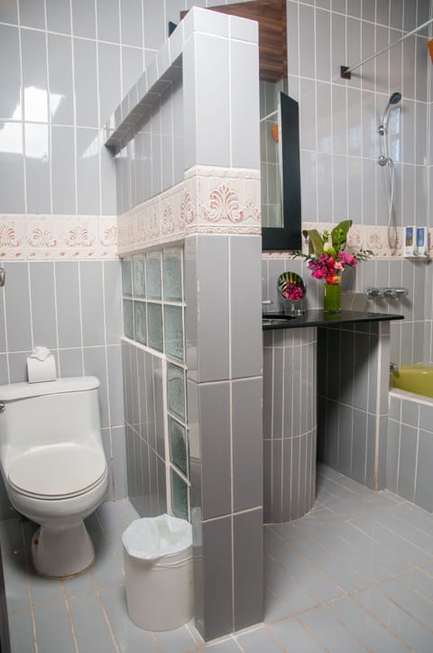 Superior Triple Room | Bathroom | Combined shower/tub, deep soaking tub, free toiletries, hair dryer