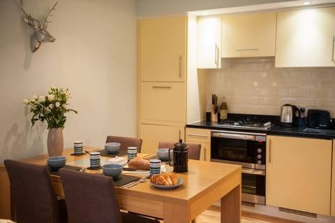 Apartment, 1 Bedroom | Private kitchen | Fridge, stovetop, dishwasher, electric kettle