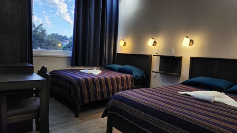 Deluxe Double Room, 2 Double Beds, Refrigerator | Individually furnished, laptop workspace, blackout drapes, soundproofing