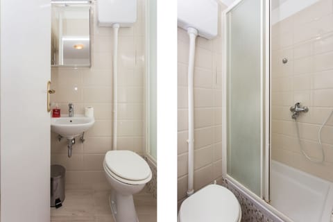 Economy Double Room, Terrace | Bathroom | Shower, hair dryer, towels