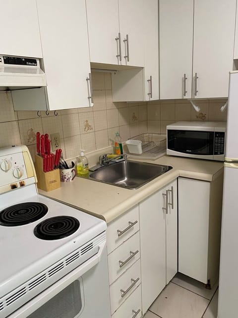 City Apartment (644 Queen St West - read checkin info) | Private kitchen | Full-size fridge, microwave