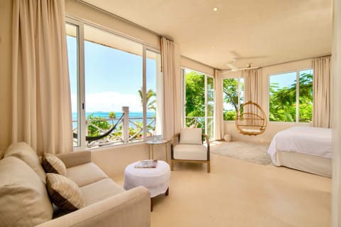 Deluxe Suite, 1 King Bed, Balcony, Ocean View | Premium bedding, in-room safe, individually decorated