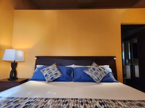 Deluxe Double Room, 1 King Bed, Ocean View | In-room safe, desk, free WiFi, bed sheets