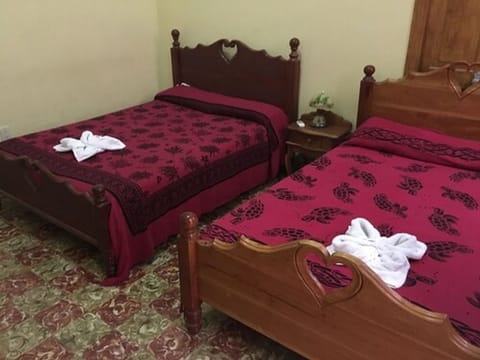 Double or Twin Room | Minibar, iron/ironing board, bed sheets