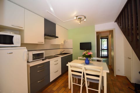 Superior Apartment, 2 Bedrooms | Private kitchen | Full-size fridge, microwave, stovetop, coffee/tea maker