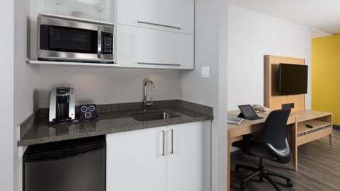 Suite, 1 Bedroom | Private kitchen | Fridge, microwave, coffee/tea maker