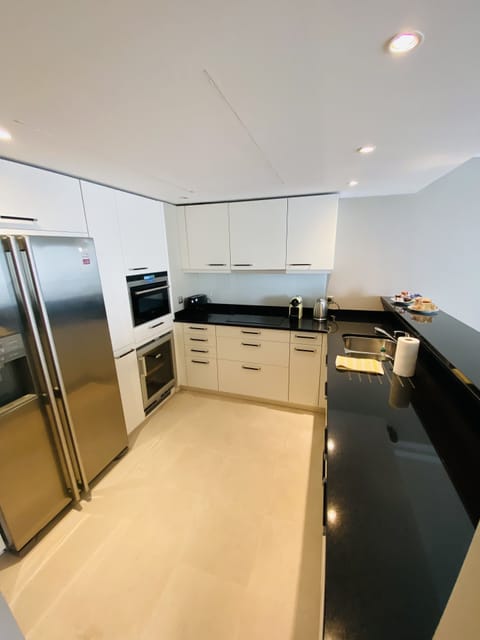 Superior Apartment, 2 Bedrooms | Private kitchen | Full-size fridge, microwave, oven, stovetop