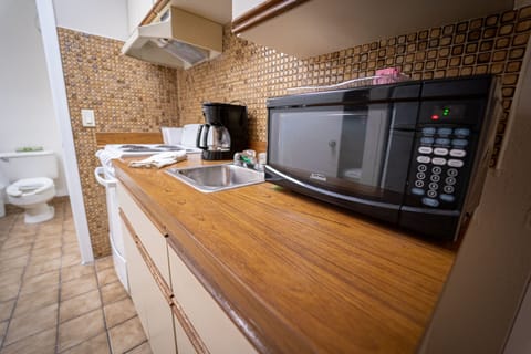 Waterfront Suite | Private kitchen | Full-size fridge, microwave, coffee/tea maker, toaster