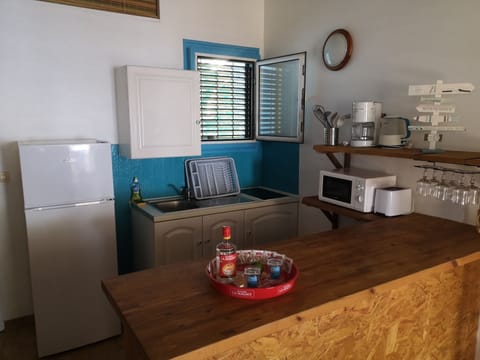 Family Bungalow, Multiple Beds, Sea View | Private kitchen | Full-size fridge, microwave, stovetop, electric kettle