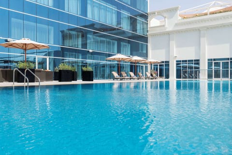 Outdoor pool, free cabanas, pool umbrellas