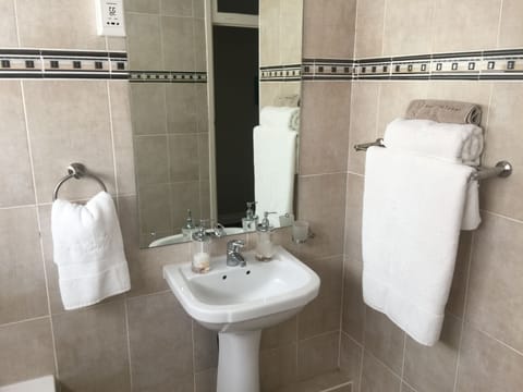 Separate tub and shower, deep soaking tub, free toiletries