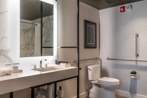 Deluxe Suite, 1 King Bed, Accessible | Bathroom | Shower, rainfall showerhead, designer toiletries, hair dryer