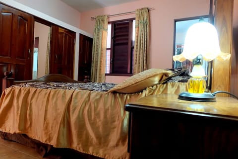 Double Room | Minibar, in-room safe, iron/ironing board, bed sheets