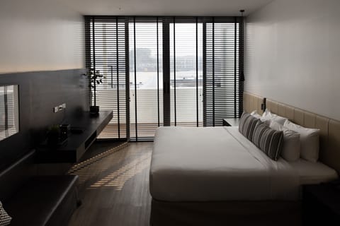 Lilit Riverfront Suite A | Premium bedding, minibar, in-room safe, individually decorated