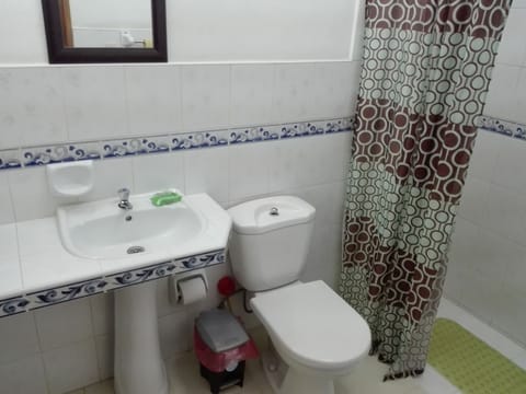 Standard Room | Bathroom | Shower, towels, soap, toilet paper