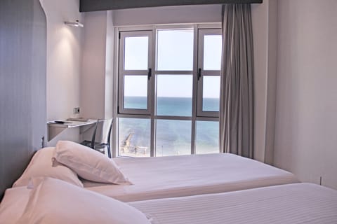 Double Room, 2 Twin Beds, Sea View | Premium bedding, down comforters, pillowtop beds, minibar